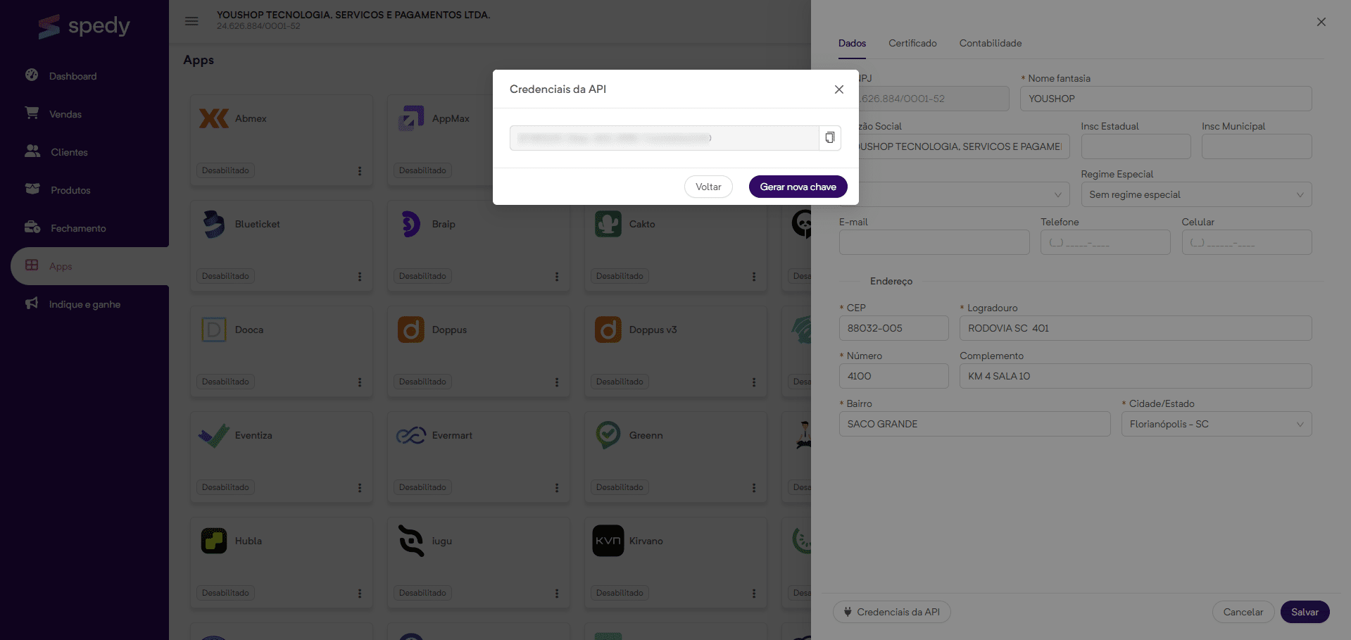 Agora, volte ao painel da Spedy, insira as credenciais da API e clique em "Gerar nova chave".