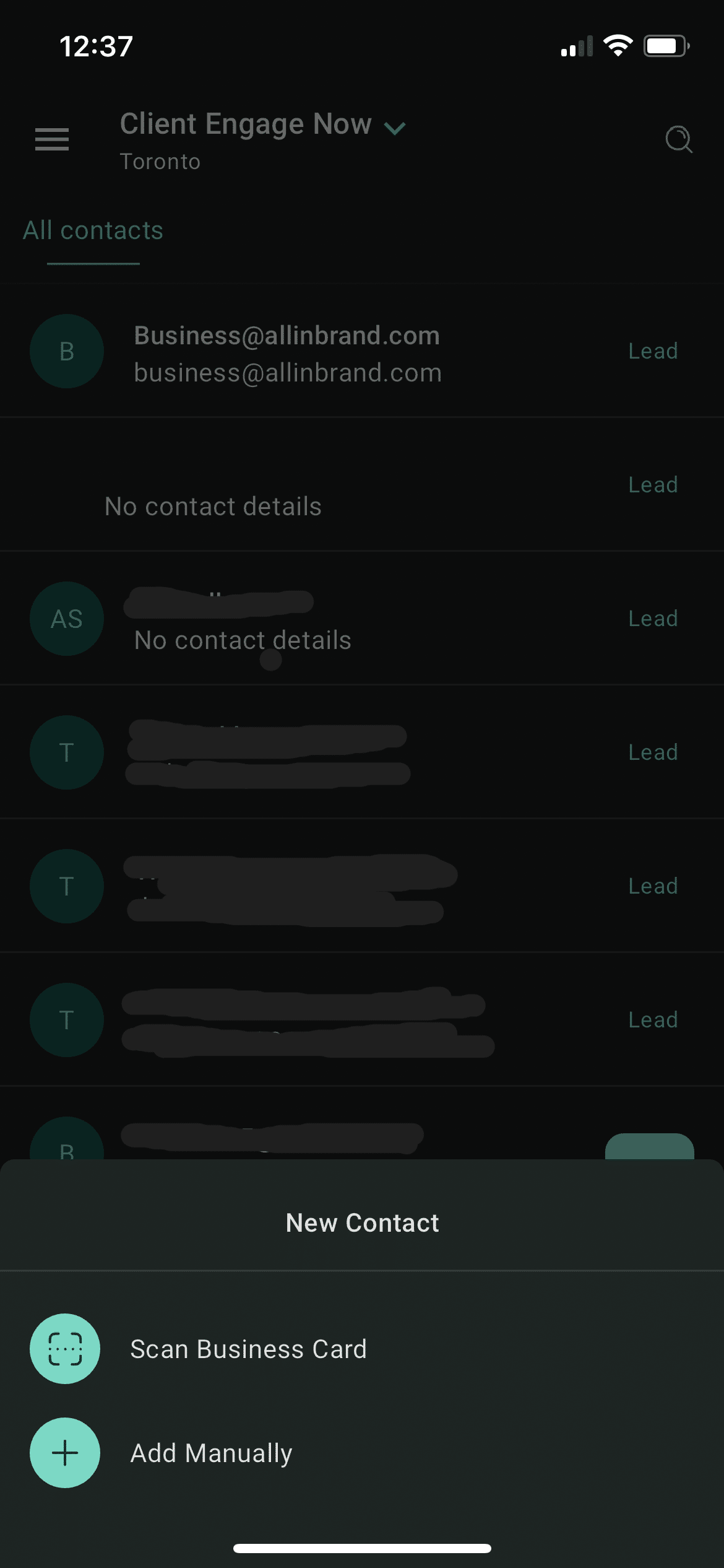 You can either Scan a Business Bard to automatically create a contact or select Add Manually to create the contact details yourself.
